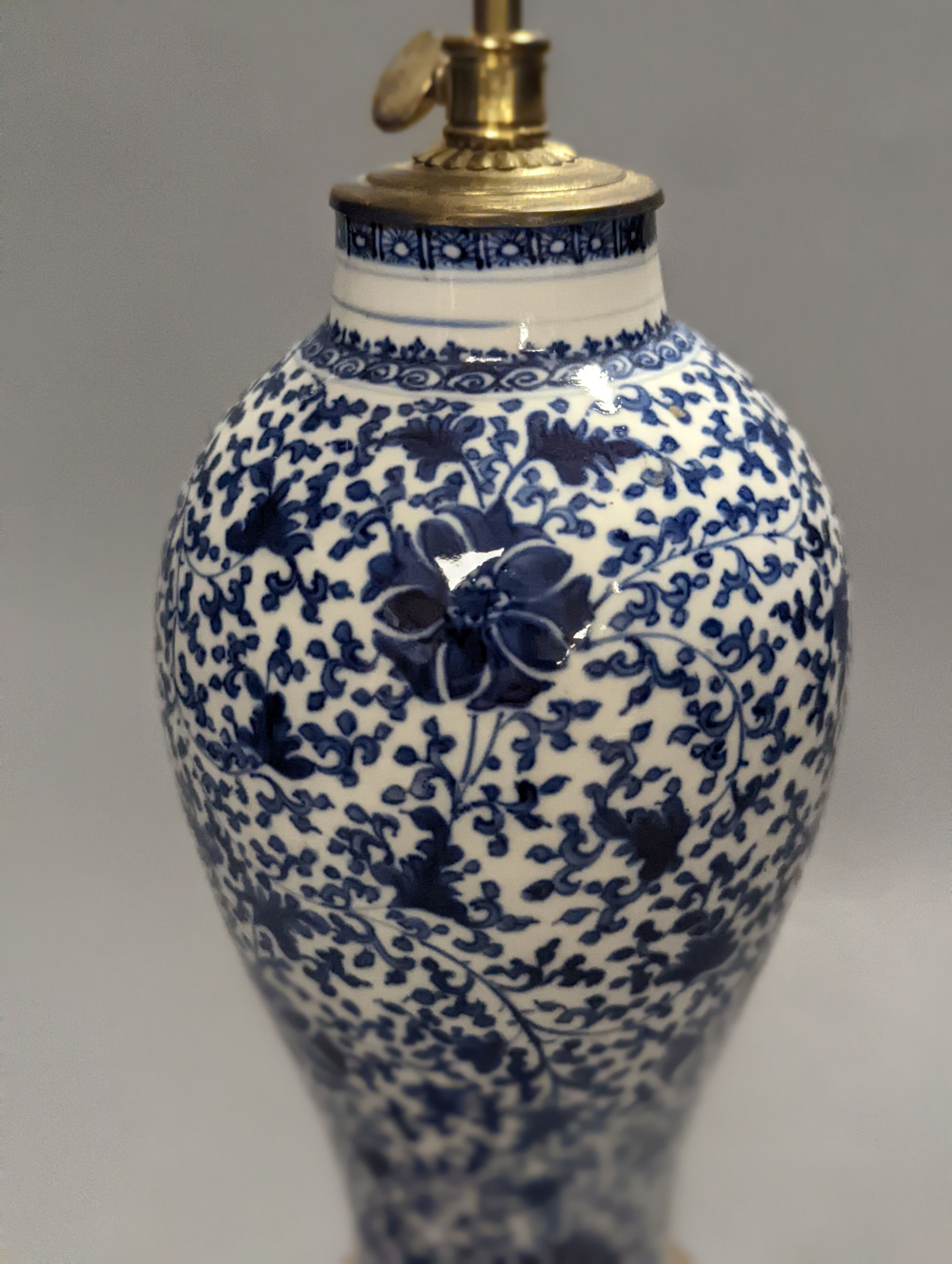 An 18th/19th century Chinese blue and white vase later mounted as a lamp, total height 34cm